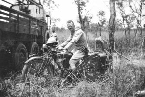 February_1929__2755_Tpr__Joy__on_AJS_1928_K6_with_six_wheeler_Thorneycroft_A3_in_the_background